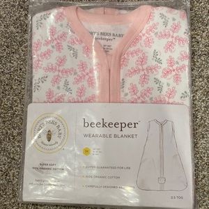 Brand New. Still in package. Burt’s Bees Baby BeeKeeper Size Medium